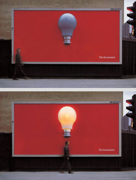 The Economist iconic lightbulb out-of-home ad on street.